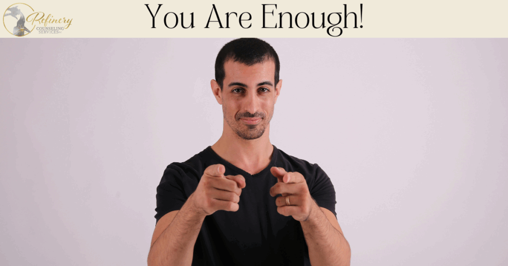 a man pointing at the camera or viewer with the words you are enough at the top of the image