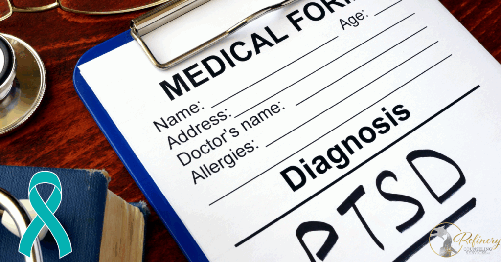 medical form on a clipboard on a wooden desk with PTSD Diagnosis written on the form