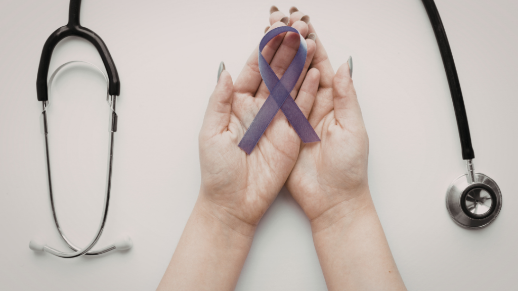 Living with Chronic Illness: The Mental Health Impact of Lupus - Two cupped hands hold a purple awareness ribbon, with stethoscopes on either side.